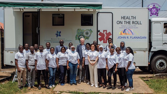 Health on the Roll mobile clinic with IGH leadership