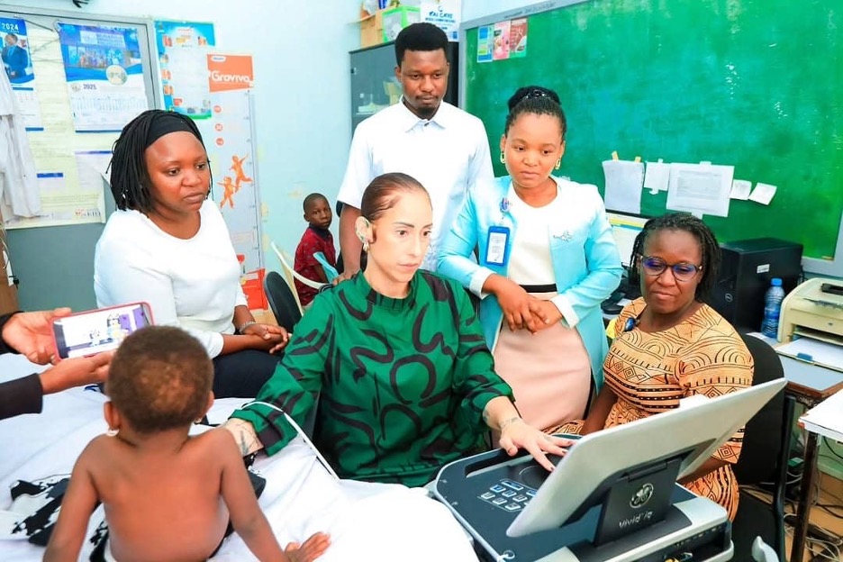 A cardiology team administers a test to a child patient