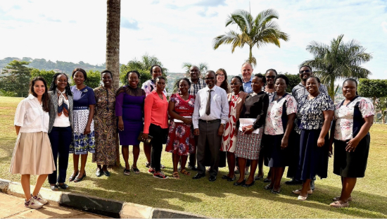 Enrich project team standing outside on a sunny day
