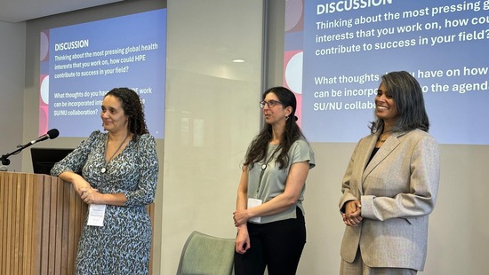 Three presenters giving a talk on the SCOHPE project