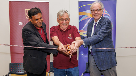Professor Wim de Villiers, Professor Deresh Ramjugernath, and Robert Murphy, MD celebrate the SU/NU Hub launch at the ribbon-cutting ceremony